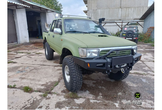 Бампер силовой передний АМЗ для Toyota Hilux 1988-1997 (передняя рессорная подвеска)