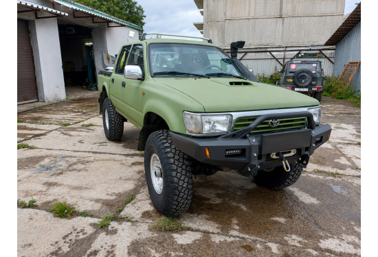Бампер силовой передний АМЗ для Toyota Hilux 1988-1997 (передняя рессорная подвеска)