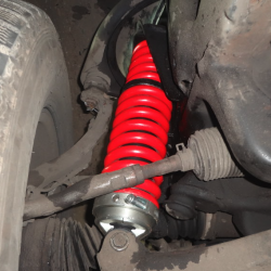 Усиленный комплект подвески для Toyota Land Cruiser 100 с передними регулируемыми стойками и задними прогрессивными пружинами