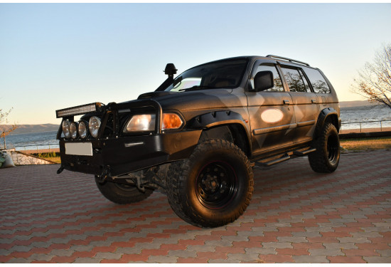 Расширители колёсных арок для Mitsubishi Pajero Sport I (1998-2007) (под силовой бампер)