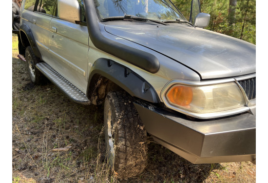 Расширители колёсных арок для Mitsubishi Pajero Sport I (1998-2007) (под силовой бампер)
