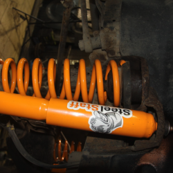 Пружина передняя усиленная SteelStaff для УАЗ Патриот и УАЗ Хантер нагрузка 0-50 кг лифт 30 мм