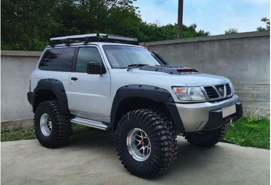 Расширители арок TORBIK для Nissan Patrol Y61 (3 двери) 1997-2004 (с накладками на оба бампера)